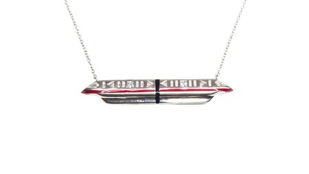 A necklace featuring the Walt Disney World Monorail