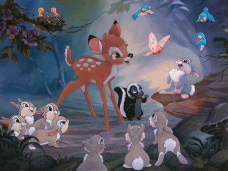An illustration of Bambi surrounded by Thumper the rabbit, Flower the skunk, bluebirds, a butterfly, baby rabbits, a mouse and an owl perched on a tree branch