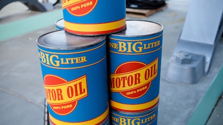 Cans of motor oil in front of Flo’s V 8 Café at Cars Land