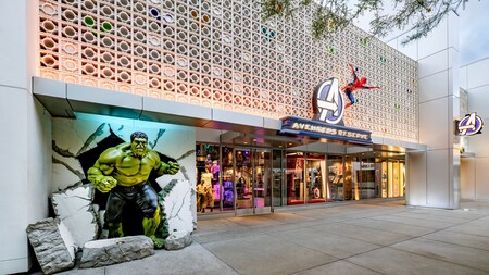 Exterior of Avengers Reserve shop featuring Hulk and Spider Man figures and Super Hero merchandise displays at the Downtown Disney District