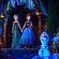 Anna, Elsa and Olaf stand in the Frozen Ever After attraction