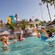 A family of 4 playing in a pool at Disney's Grand Floridian Resort & Spa