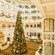 The lobby of Disney's Grand Floridian Resort & Spa decorated for Christmas, featuring garlands and a giant Christmas tree