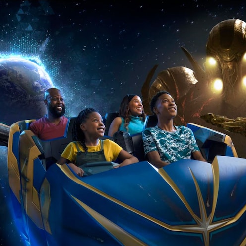 A family rides in a space vehicle while a spaceship and out of this world creature follows them.