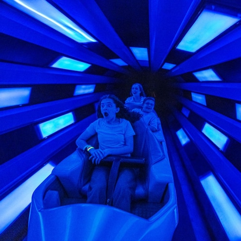 Guests riding on Space Mountain in Magic Kingdom park at Walt Disney World Resort