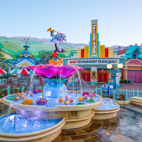 The center of Centoonial Park featuring Mickey and Minnie’s Runaway Railway in Disneyland Park