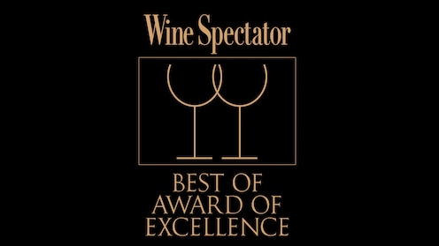 The Wine Spectator logo, the silhouette of 2 glasses of wine and text that reads ′Best of Award of Excellence′
