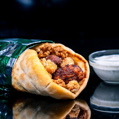 An Impossible Victory Falafel with Tzatziki sauce from Shawarma Palace in Disney California Adventure Park