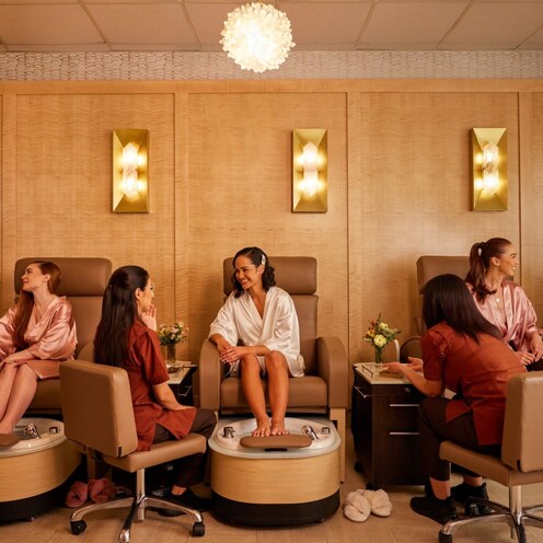 Guests enjoying manicure and pedicure treatments at Tenaya Stone Spa.