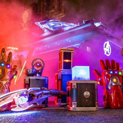 An arrangement of Avengers merchandise, including Thanos’ Infinity Gauntlet, Loki’s scepter, the Tesseract and more