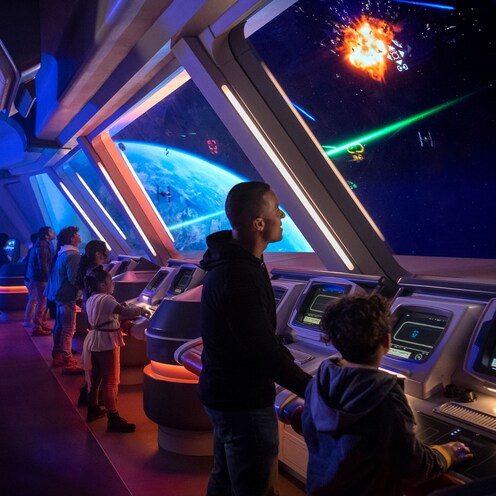 Guests in the bridge training area of Star Wars: Galactic Starcruiser