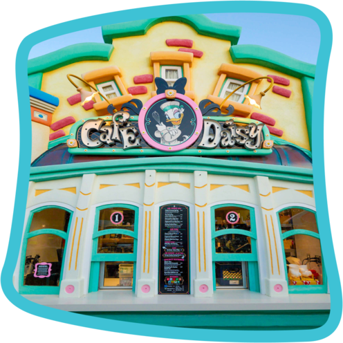 Café Daisy featuring Daisy Duck on a sign at Centoonial Park in Mickey’s Toontown