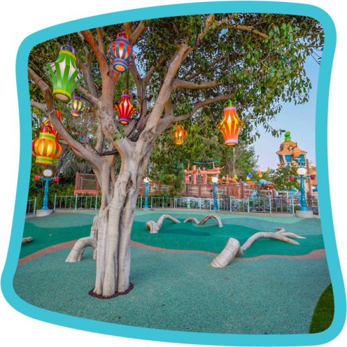 A tree with lanterns hanging from the branches at Centoonial Park in Mickey’s Toontown