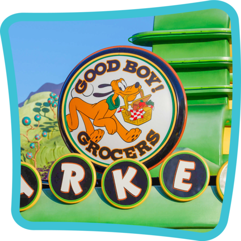Good Boy Grocers featuring Pluto on a sign in Mickey’s Toontown at Disneyland Park
