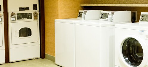 The laundry room at Aulani contains multiple washing machines and dryers