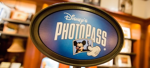 A sign for Disney PhotoPass service