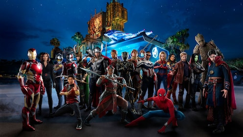 A large group of Marvel Super Heroes in front of Avengers Headquarters