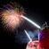 Brilliant fireworks light up the night sky above a Disney Cruise Line ship 