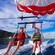 A young man and woman parasailing near Catalina island