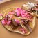 2 different types of tacos on a plate