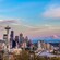 The Seattle skyline near a snowcapped mountain