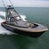 A high speed fishing boat sailing through the water