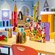 A table and chairs with childrens books, at Its a Small World Nursery on the Disney Dream