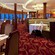 Dining room at Palo restaurant with Italian inspired decor, banquette seating and floor to ceiling windows