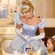 Princess Cinderella greets little girls in tiaras at a fancy luncheon