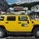 A Hummer is parked on a pier in front of a sign that says Welcome to Alaskas first city, Ketchikan