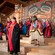 Performers in traditional Tlingit dress put on a show in a native lodge setting