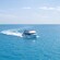 A boat full of people in the ocean