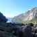 Boulders between 2 rocky hills, at the mouth of a river