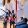 A family in a pointing pose for a photographer on board the Disney Treasure