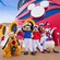 Pluto, Donald Duck, Mickey Mouse, Minnie Mouse, Goofy and Daisy Duck, dressed as sailors and captains on a Disney Cruise Line ship's upper deck