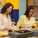 Two Guests preparing food in a kitchen