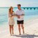 A couple strolling along the shoreline at Kuza Beach in Cozumel, Mexico  