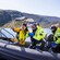 A guide pointing something out to Guests riding in a rigid inflatable boat