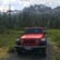 An off road vehicle on a rugged trail in Chichagof Island, Alaska