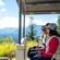 Three Guests riding a tram and enjoying views of Hoonah Mountain in Icy Strait, Alaska