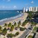 High rise buildings lining the street near the beach and shoreline of San Juan, Puerto Rico