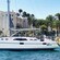 A sailboat at a harbor near the Catalina Casino at Santa Catalina Island