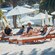 Guests relaxing on loungers at Descanso Beach Club