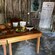 A table with cooking ingredients inside a thatch hut