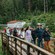 Guests walking across a wooden bridge in Ketchikan, Alaska