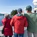 3 passengers on a tour boat looking out to open waters