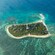 A lighthouse surrounded by lush landscape on New Amadee Island
