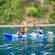 Two people paddling in a kayak along the Waitukubuli Sea Trail in Roseau, Dominica