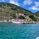 A catamaran on the water next to Jost Van Dyke in the British Virgin Islands