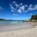 A sandy beach with gentle waves